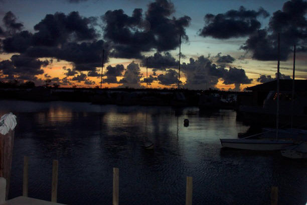 Sunset from the dock in Poehina. Photograph by Liza Schillo